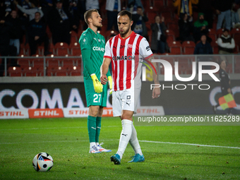 Virgil Ghita and goalkeeper Henrich Ravas during the game between KS Cracovia and Stal Mielec in Krakow, Poland, on September 30, 2024. PKO...