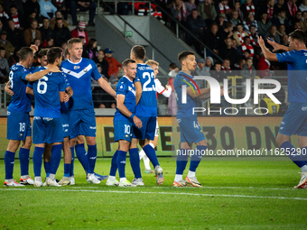 Stal Mielec players celebrate scoring a goal during the game between KS Cracovia and Stal Mielec in Krakow, Poland, on September 30, 2024. P...