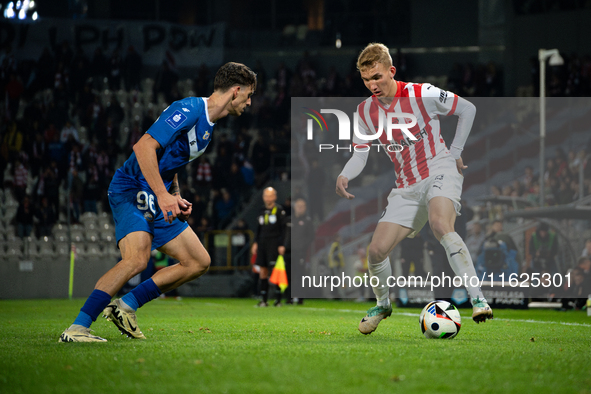 Bartosz Biedrzycki and Robert Dadok participate in the game between KS Cracovia and Stal Mielec in Krakow, Poland, on September 30, 2024. PK...