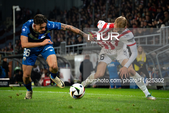 Bartosz Biedrzycki and Robert Dadok participate in the game between KS Cracovia and Stal Mielec in Krakow, Poland, on September 30, 2024. PK...