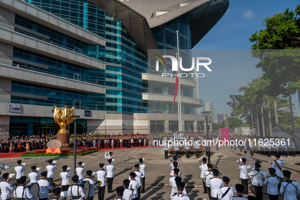 The flag raising ceremony takes place in Hong Kong, China, on October 1, 2024. 