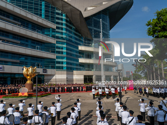 The flag raising ceremony takes place in Hong Kong, China, on October 1, 2024. (