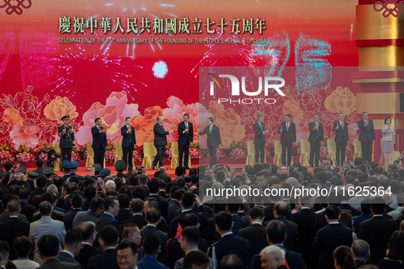 The toasting ceremony takes place on stage during the government national day reception in Hong Kong, on October 1, 2024. 