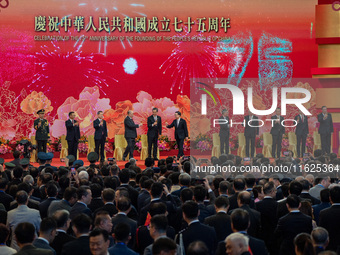 The toasting ceremony takes place on stage during the government national day reception in Hong Kong, on October 1, 2024. (