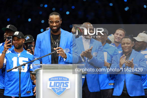 DETROIT,MICHIGAN-September 30: Former Detroit Lions player Calvin Johnson Jr. speaks during the ceremony honoring his induction to the Pride...