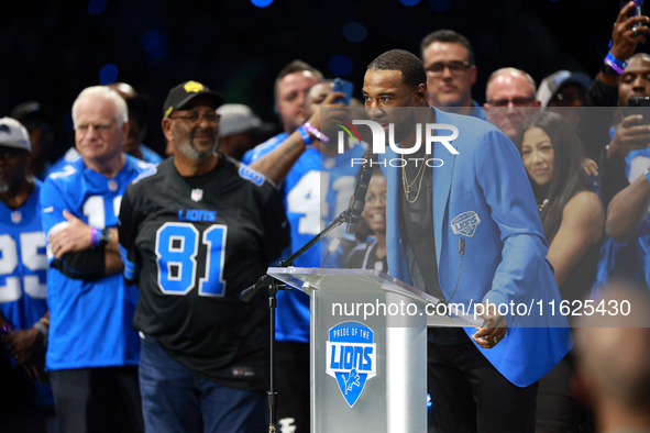 DETROIT,MICHIGAN-September 30: Former Detroit Lions player Calvin Johnson Jr. speaks during the ceremony honoring his induction to the Pride...