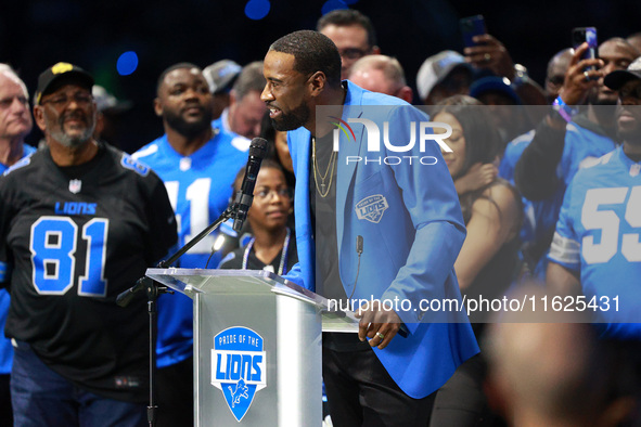 DETROIT,MICHIGAN-September 30: Former Detroit Lions player Calvin Johnson Jr. speaks during the ceremony honoring his induction to the Pride...