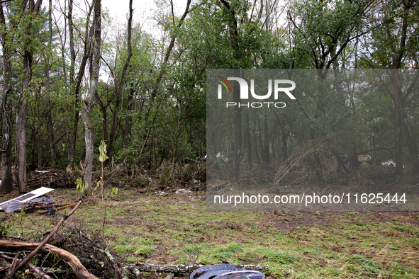 Debris is scattered in Chilhowie, Virginia on September 30, 2024, after Hurricane Helene caused the South Fork Holston River to overflow. 