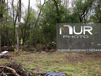 Debris is scattered in Chilhowie, Virginia on September 30, 2024, after Hurricane Helene caused the South Fork Holston River to overflow. (