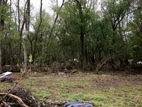 Debris is scattered in Chilhowie, Virginia on September 30, 2024, after Hurricane Helene caused the South Fork Holston River to overflow. (