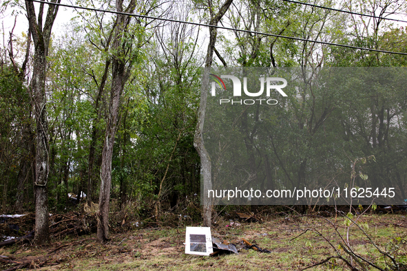 Debris is scattered in Chilhowie, Virginia on September 30, 2024, after Hurricane Helene caused the South Fork Holston River to overflow. 