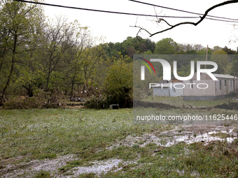 Debris is scattered in Chilhowie, Virginia on September 30, 2024, after Hurricane Helene caused the South Fork Holston River to overflow. (