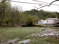 Debris is scattered in Chilhowie, Virginia on September 30, 2024, after Hurricane Helene caused the South Fork Holston River to overflow. (