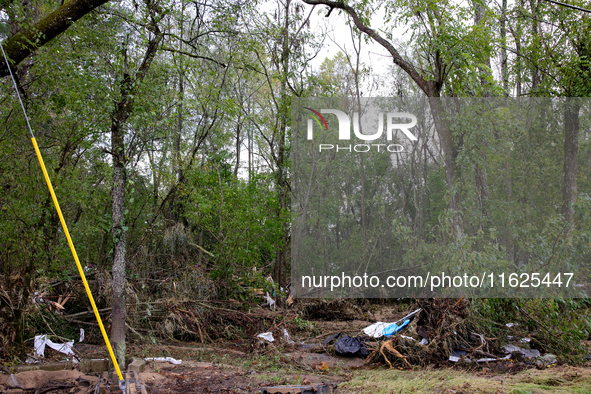 Debris is scattered in Chilhowie, Virginia on September 30, 2024, after Hurricane Helene caused the South Fork Holston River to overflow. 