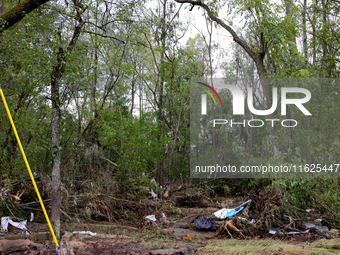 Debris is scattered in Chilhowie, Virginia on September 30, 2024, after Hurricane Helene caused the South Fork Holston River to overflow. (