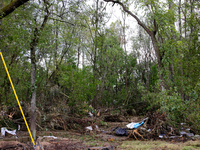 Debris is scattered in Chilhowie, Virginia on September 30, 2024, after Hurricane Helene caused the South Fork Holston River to overflow. (