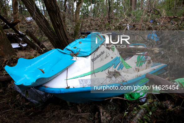 A jet ski sits in the woods in Chilhowie, Virginia on September 30, 2024 after Hurricane Helene flooded the South Fork Holston River several...