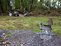 Debris is scattered in Chilhowie, Virginia on September 30, 2024, after Hurricane Helene caused the South Fork Holston River to overflow. (