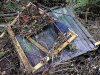 Debris is scattered in Chilhowie, Virginia on September 30, 2024, after Hurricane Helene caused the South Fork Holston River to overflow. (