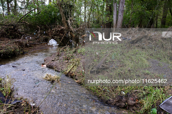 Debris is scattered in Chilhowie, Virginia on September 30, 2024, after Hurricane Helene caused the South Fork Holston River to overflow. 