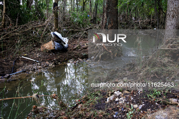 Debris is scattered in Chilhowie, Virginia on September 30, 2024, after Hurricane Helene caused the South Fork Holston River to overflow. 