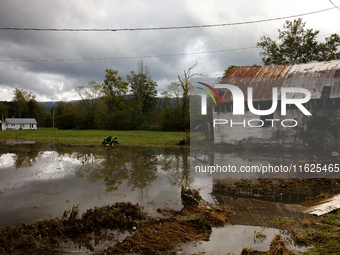 A rural property is flooded in Chilhowie, Virginia on September 30, 2024, after Hurricane Helene caused widespread in the region. (