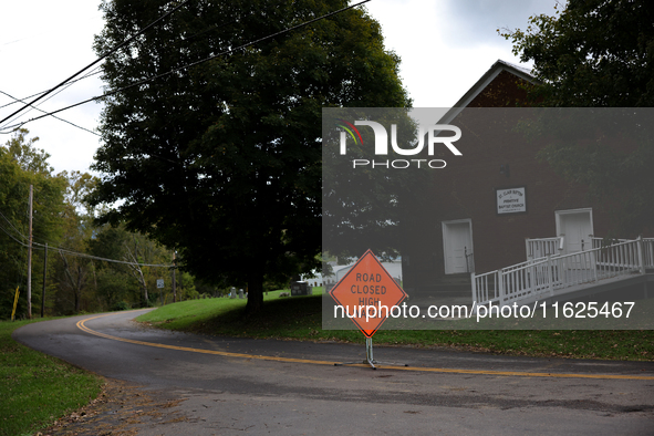 A road is blocked in Chilhowie, Virginia on September 30, 2024, after Hurricane Helene caused severe flooding in the region. 