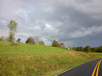 A rainbow is seen over a hilltop in Whitetop, Virginia on September 30, 2024 after Hurricane Helene caused damage in the region several days...