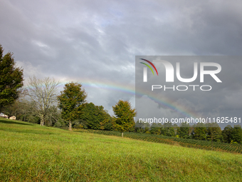 A rainbow is seen over a hilltop in Whitetop, Virginia on September 30, 2024 after Hurricane Helene caused damage in the region several days...