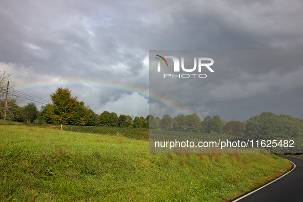 A rainbow is seen over a hilltop in Whitetop, Virginia on September 30, 2024 after Hurricane Helene caused damage in the region several days...