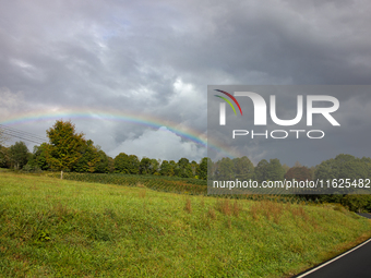 A rainbow is seen over a hilltop in Whitetop, Virginia on September 30, 2024 after Hurricane Helene caused damage in the region several days...