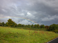 A rainbow is seen over a hilltop in Whitetop, Virginia on September 30, 2024 after Hurricane Helene caused damage in the region several days...