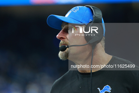 DETROIT,MICHIGAN-September 30: Detroit Lions head coach Dan Campbell follows the play during the second half of an NFL football game between...