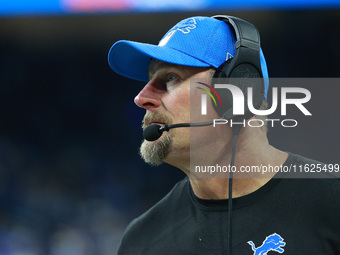 DETROIT,MICHIGAN-September 30: Detroit Lions head coach Dan Campbell follows the play during the second half of an NFL football game between...