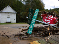 Street signs lay toppled in Lansing, North Carolina on September 30, 2024 after Hurricane Helene caused widespread damage in the region. (