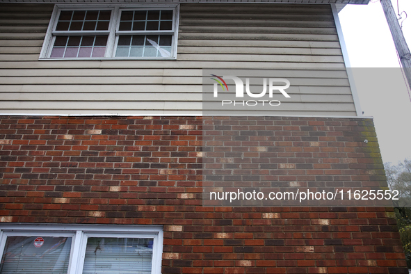 Water damage is seen on the brick facade of the Lansing Volunteer Fire Department in Lansing, North Carolina on September 30, 2024 after Hur...