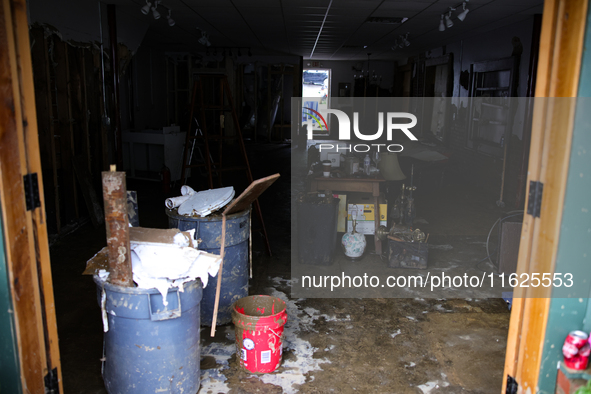 Repairs are seen at a business in Lansing, North Carolina on September 30, 2024 after Hurricane Helene caused widespread damage in the regio...