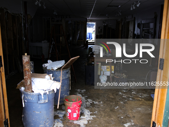 Repairs are seen at a business in Lansing, North Carolina on September 30, 2024 after Hurricane Helene caused widespread damage in the regio...