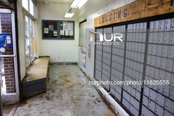 Mud covers the floor of the U.S. Post Office in Lansing, North Carolina on September 30, 2024 after Hurricane Helene caused widespread damag...