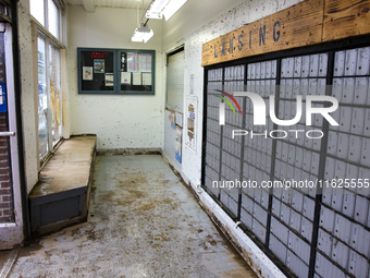 Mud covers the floor of the U.S. Post Office in Lansing, North Carolina on September 30, 2024 after Hurricane Helene caused widespread damag...