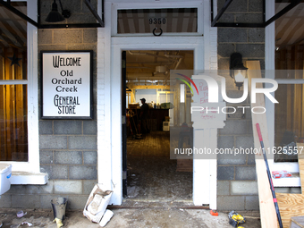 A sign at a business in Lansing, North Carolina instructs people not to enter or remove items on September 30, 2024 after Hurricane Helene c...