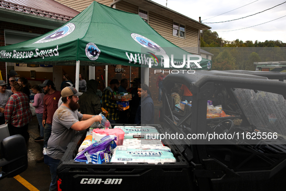 Volunteers collect donations at the Lansing Volunteer Fire Department in Lansing, North Carolina on September 30, 2024, after Hurricane Hele...