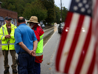 Volunteers collect donations at the Lansing Volunteer Fire Department in Lansing, North Carolina on September 30, 2024, after Hurricane Hele...