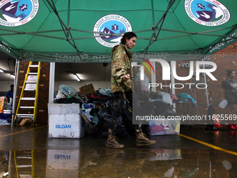 Volunteers collect donations at the Lansing Volunteer Fire Department in Lansing, North Carolina on September 30, 2024, after Hurricane Hele...