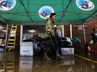 Volunteers collect donations at the Lansing Volunteer Fire Department in Lansing, North Carolina on September 30, 2024, after Hurricane Hele...