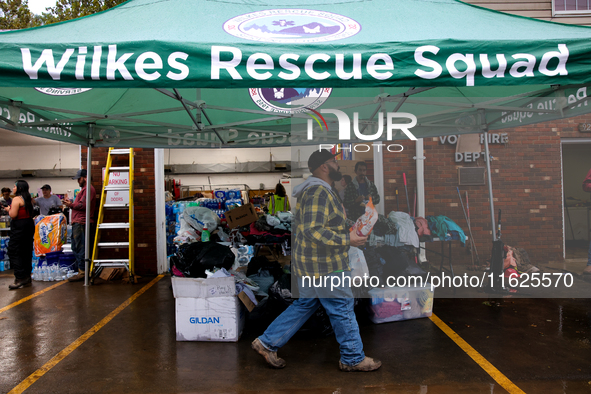 Volunteers collect donations at the Lansing Volunteer Fire Department in Lansing, North Carolina on September 30, 2024, after Hurricane Hele...