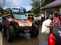 Volunteers deliver donations at the Lansing Volunteer Fire Department in Lansing, North Carolina on September 30, 2024, after Hurricane Hele...