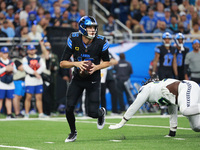 DETROIT,MICHIGAN-September 30: Detroit Lions quarterback Jared Goff (16) runs the ball during the first half of an NFL football game between...