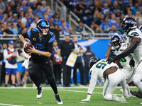 DETROIT,MICHIGAN-September 30: Detroit Lions quarterback Jared Goff (16) runs the ball during the first half of an NFL football game between...