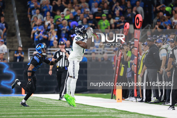 DETROIT,MICHIGAN-September 30: Seattle Seahawks wide receiver DK Metcalf (14) catches a pass during the first half of an NFL football game b...